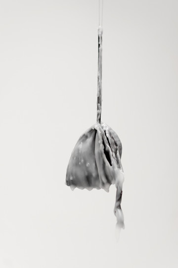 <p style="font-size:10px">Charbel-joseph H. Boutros, Night Cartography #3, 2016-2021, Airplane sleeping mask, votive candle wax, dreams, wishes, dimensions variable</p>
<p style="font-size:10px">Wax from votive candles (stolen from a church situated in the Lebanese mountains), is poured on an airplane sleeping mask, used by the artist for sleeping during several months.</p> - © Image courtesy of the artist and Grey Noise, Dubai., Paris Internationale