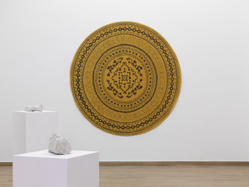 Installation shot of Nasan Tur´s show titled in every moment at Callirrhoë, Athens; focusing on his new work Scarred carpet - greetings from Afghanistan, Syria and Kurdistan. - © photo © Stathis Mamalakis | Callirrhoë, Athens 2023, Paris Internationale