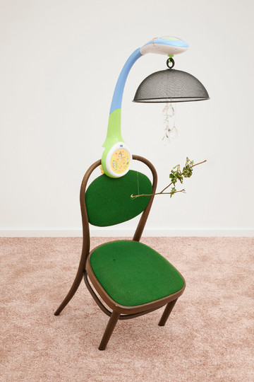 Phung-Tien Phan
*Trust Camp (normal)*, 2018
chair, Chicco mobile, fly hood, chandelier pendants, rose twigs
50 x 70 x 150 cm - © Photo: Mareike Tocha, Paris Internationale