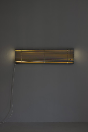 Davide Stucchi, Exuberant Led, 2025, Led panel, pvc venetian blinds, cable, electric plug, 10 × 120 × 31 cm - © ph. Andrea Rossetti 
courtesy of the artist and Martina Simeti, Milan, Paris Internationale