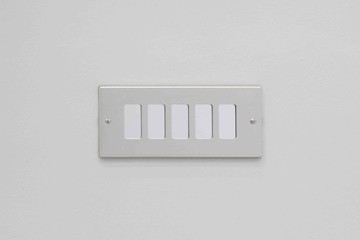 Davide Stucchi, Light Switch (Entryway), 2024, Acrylic mirror, light switch, 7 × 13,5 × 0,5 cm - © ph. Andrea Rossetti 
courtesy of the artist. and Martina Simeti, Milan, Paris Internationale