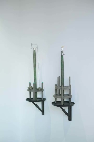 Tant Yunshu ZHONG
Pillars on the Earth's Surface
Cast iron bracket, cast iron disc, wooden frame, wooden stick, aluminum alloy fork head, copper, rope, rice toy model
75 x 25 x 25 cm and 65 x 25 25 cm 
2025 - © @taannttaannt
@tabularasa_gallery

 &copy;Tabula Rasa Gallery/Tant Yunshu Zhong, 2025. All artworks and images are protected by copyright., Paris Internationale