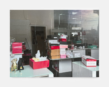 Tomek Tofilski, Sklep z butami 2, varnished pigment print on cardboard, wood, staples, 64 × 85 cm, 2025 - © Paris Internationale