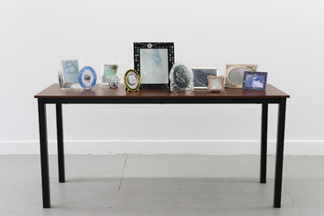 Hélène Fauquet, Ether, 2024
Prints, frames, table
41 × 63 × 24 in. (104.1 × 160 × 61 cm)
Courtesy the artist and Ulrik, New York. - © Photo &copy; Stephen Faught, Paris Internationale