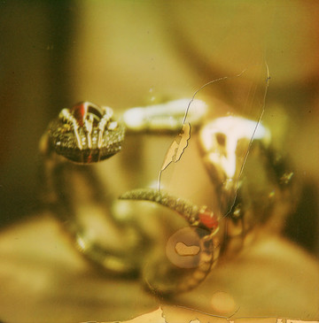 Elie TOP
Diamond Serpent Cuff
Collection Magica Naturae

Serpent bracelet, with a body wrapped in scales of rose gold, yellow gold, and distressed silver, punctuated with diamonds, ending on one side with an articulated head, paved with diamonds and animated with yellow sapphire eyes, set at its top with a rubellite cabochon, and on the other side with an articulated tail paved with diamonds and set with a ruby cabochon.

Composition
Diamonds
Rubelite
Yellow Sapphire
Ruby
18K Yellow & Rose Gold
Distressed Silver     
Unique Piece - © Julien Carreyn, Paris Internationale