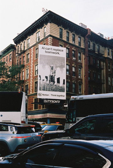 “AI can't replace teamwork shot on Pentax KX, New York NY 10013, July 2026” - © Mona Varichon, Paris Internationale